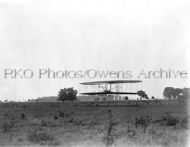 Wilbur Wright flying close to the ground