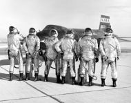 NASA X-15 test pilot clown around in front of aircraft