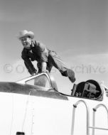 Test pilot Joe Walker getting out of X-1A