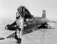 Test pilot Neil Armstrong next to X-15 after flight