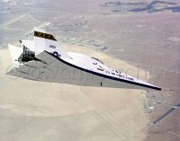 X-24B flying overhead Edwards AFB after high speed flight