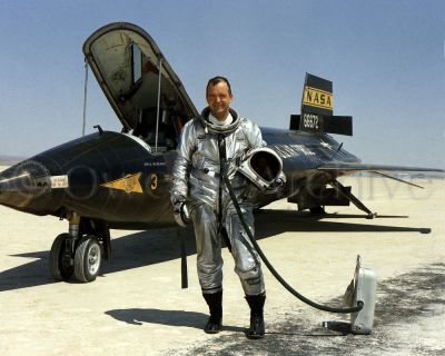 NASA test pilot Bill Dana next to X-15 aircraft