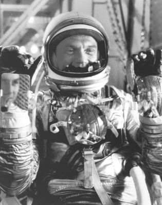 Astronaut John Glenn gives ready sign prior to Mercury Atlas 6 launch