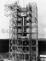 First Saturn booster rocket is lowered into dynamic test stand