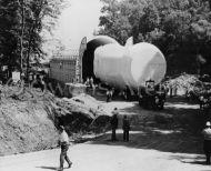 First Saturn booster is unloaded above Wheeler Dam on Tennessee River