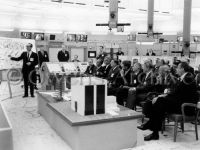 President John F. Kennedy and NASA officials are briefed about Project Apollo
