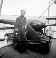 Admiral John A. Dahlgren next to a Dahlgren gun on U.S.S. Pawnee
