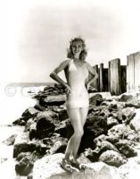 Carole Landis wearing swimsuit