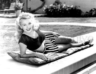 Carole Landis at her home
