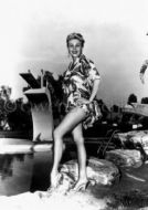 Mitzi Gaynor wearing swimsuit with high heels