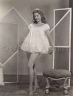 Martha Hyer wearing short nightgown