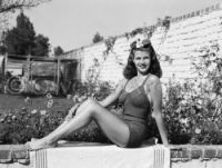 Rita Hayworth wearing swimsuit