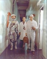 Astronaut John H. Glenn with Flight Surgeon prior to Mercury launch