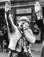 Sudeten German Woman Salutes Parading Nazis