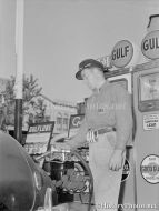 Gulf Gas Station Attendant Pumping Gas 1942