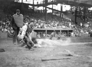 New York Yankee Lou Gehrig slides into home plate