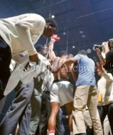 Muhammad Ali raising fist in triumph 1965