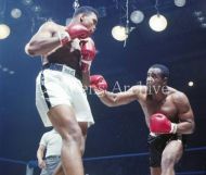Sonny Liston punching Muhammad Ali 