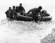 US Soldiers help Shipwrecked Troops, Omaha Beach