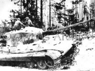 Soldier with First Army on Captured Panzer Tank 
