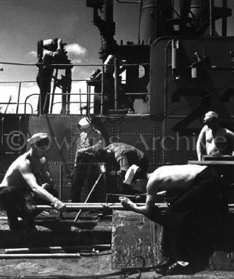 Sailors Repair Submarine at Pearl Harbor
