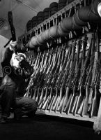 American Sailor Inspecting Firearms
