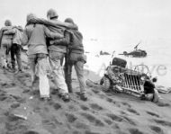 Navy corpsmen help wounded Marines, Iwo Jima