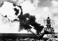 USS Iowa fire guns during battle