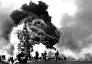 USS Bunker Hill hit by Kamikazes