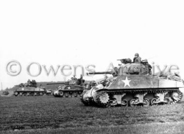 Sherman tanks on patrol near Normandy