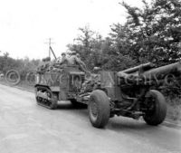M5 Artillery Tractor towing 155mm M1 gun