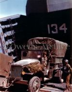 Trucks and Supplies are Loaded on LST