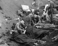 Wounded Marines at Iwo Jima first aid station