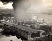 Battleship Row burning Pearl Harbor, Hawaii. December 7, 1941