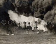 USS West Virginia & and the USS Tennessee burning at Pearl Harbor