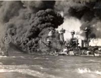 Battleship Row on fire Pearl Harbor
