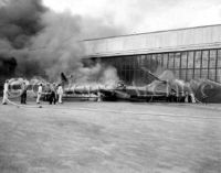 Planes burning from bombing attack at Pearl Harbor N.A.S.