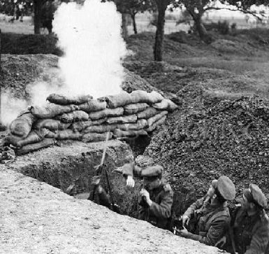British soldiers in trench under fire