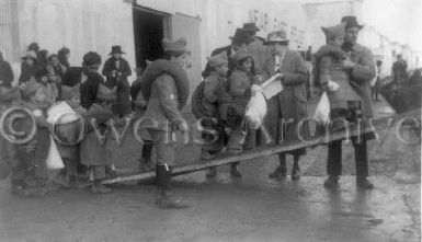 Orphans boarding barges to Greece