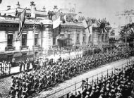 Soldiers and sailors march past Allies Headquarters
