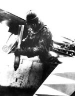 German Aviator Dropping Bomb Over Battlefield