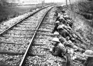 Troops hold the railway line in Merville, France