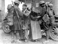 French couple greeting soldiers